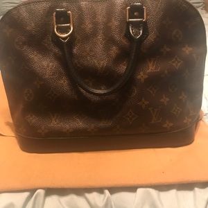 Authentic Louis Vuitton Alma handbag